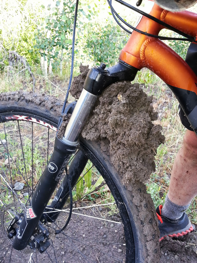 Mud built-up on front wheel of 29er mountian bike