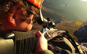Dallen aiming at mule deer with X-Bolt