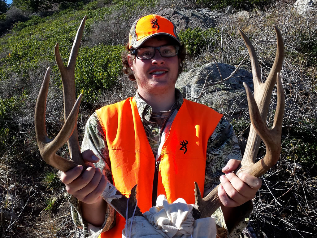 Dallen with the caped head and mule deer rack