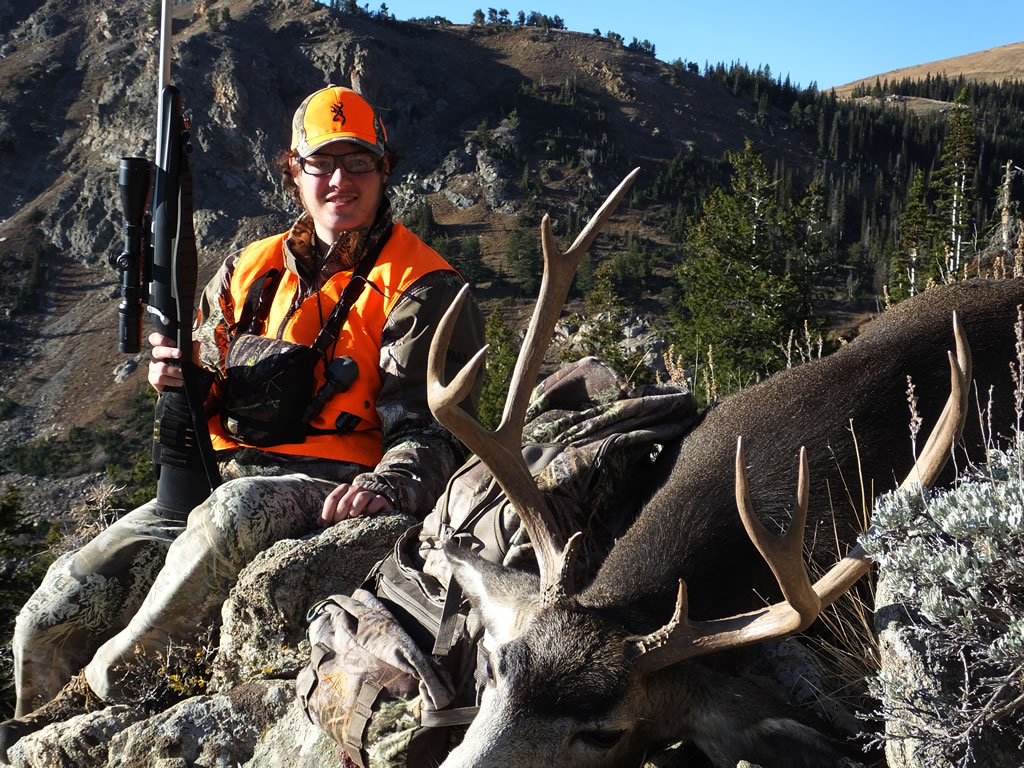 Dallen with 4 point mule deer and Alps Pathfinder pack