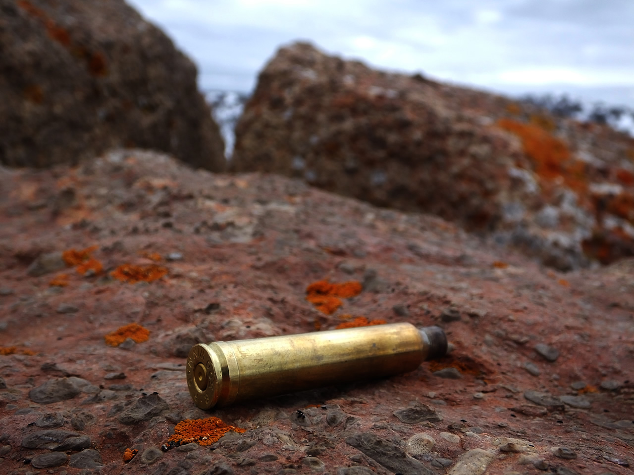 300 Win Mag empty shell on cliff