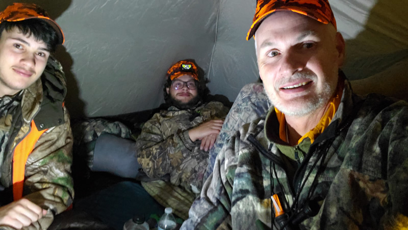 Selie in the tent elk hunting in the Uinta mountains.